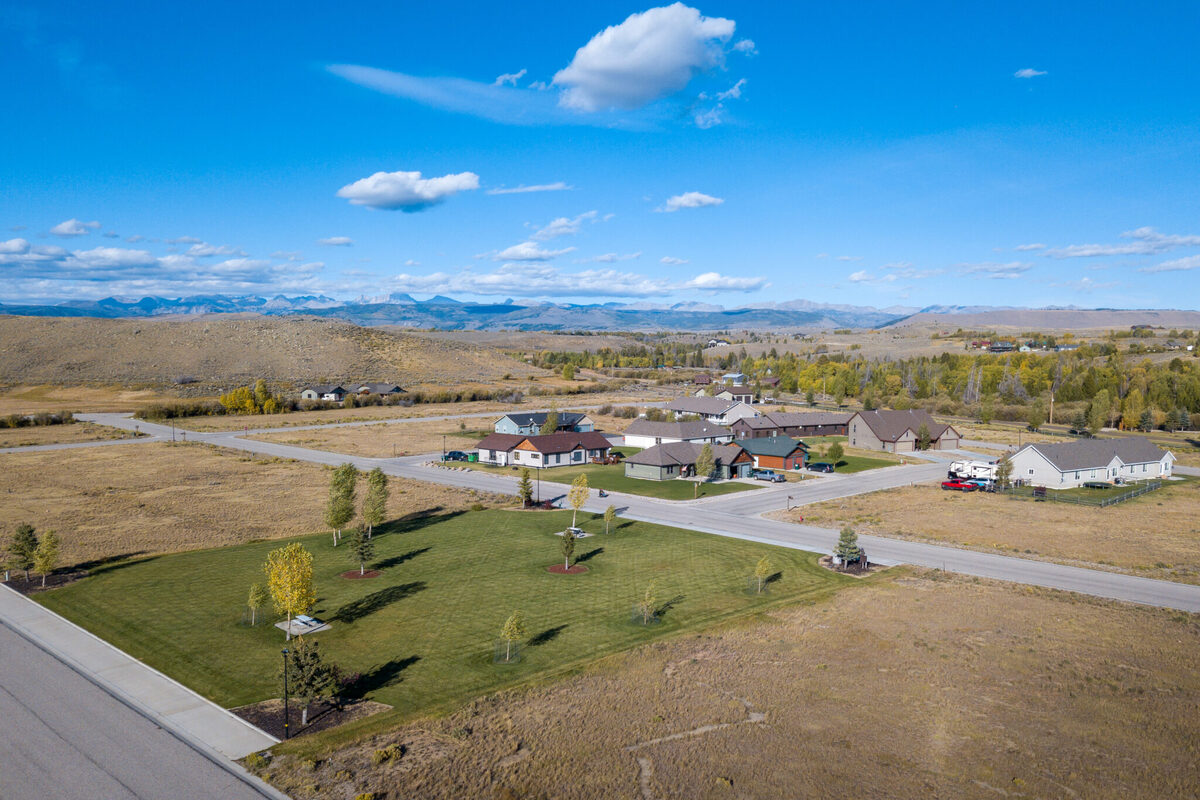 Aerial overview of Split Diamond Meadows residential lots and streets in Pinedale, Wyoming